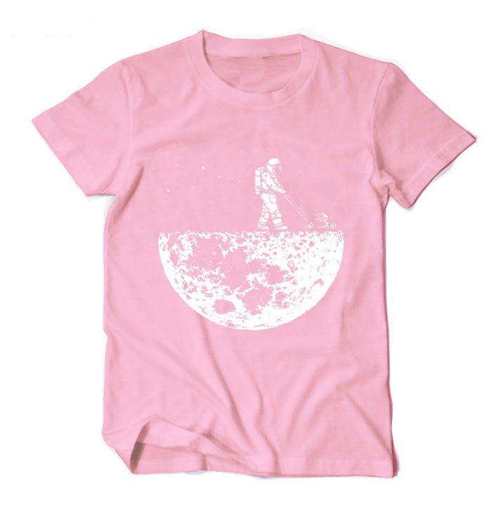 Pink MONO//FIT astronaut graphic tees featuring an astronaut on a crescent moon design