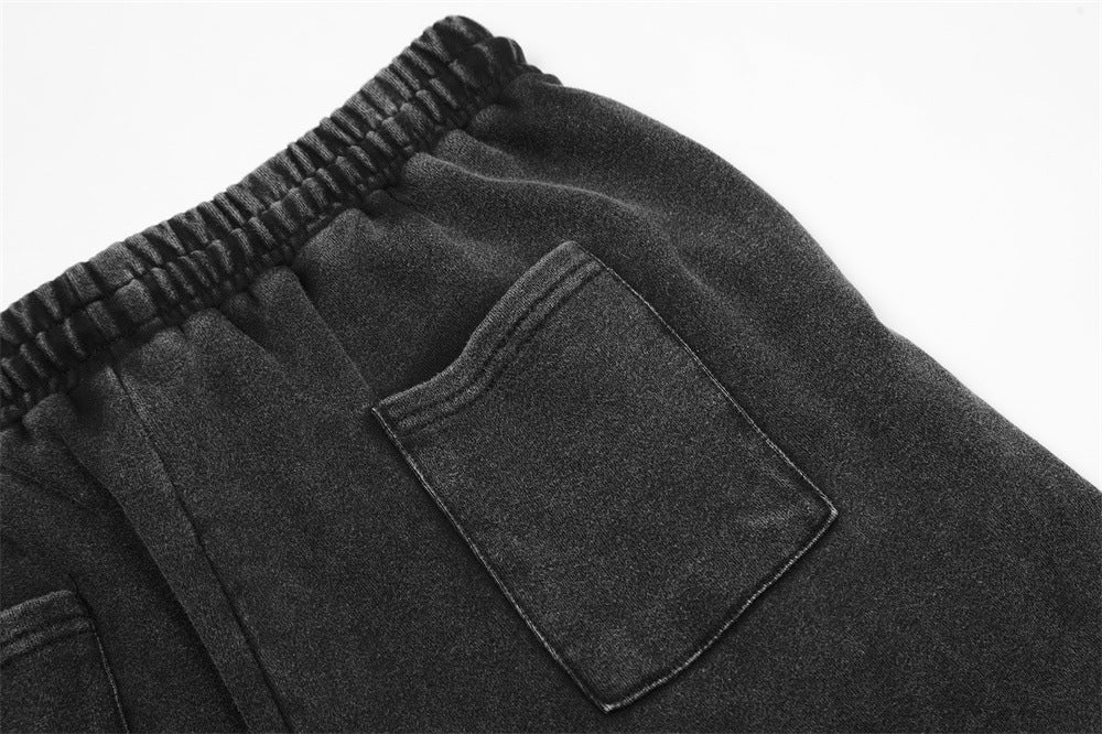 Stylish black shorts for men featuring an elastic waistband and a back pocket detail