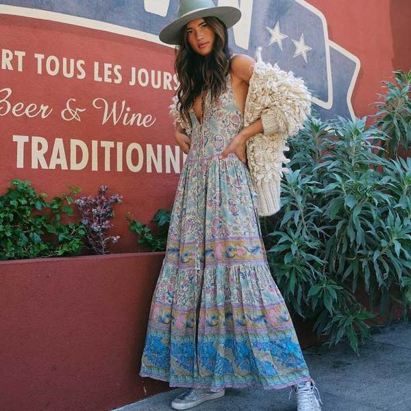 MONO//FIT Bohemian beach dresses in a flowy design with vibrant patterns and a stylish hat