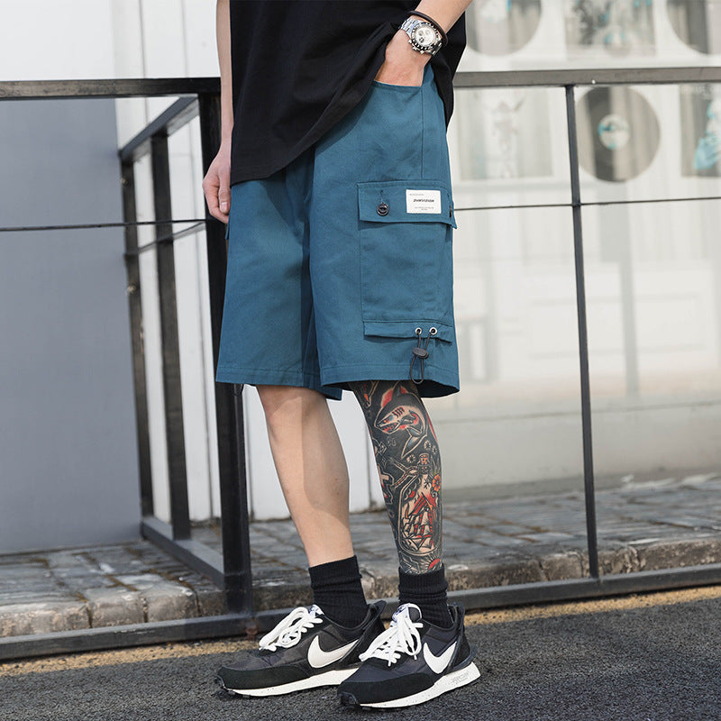 MONO//FIT Casual Black Shorts Men in a stylish outdoor setting with a relaxed fit