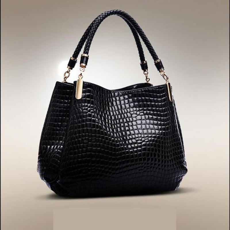 MONO//FIT crocodile pattern bag in black with stylish braided handles for everyday elegance