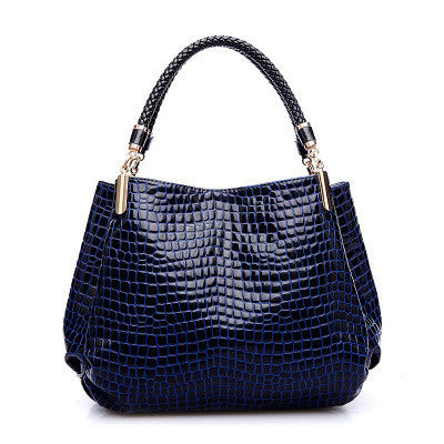 Stylish MONO//FIT crocodile pattern bag in navy blue with a braided handle for a chic look