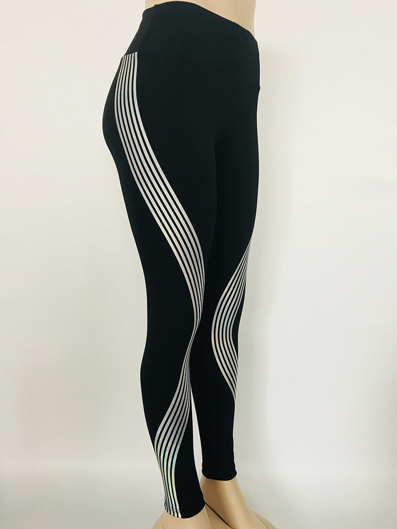 Black glow in the dark fitness pants with sleek white striped design for active wear