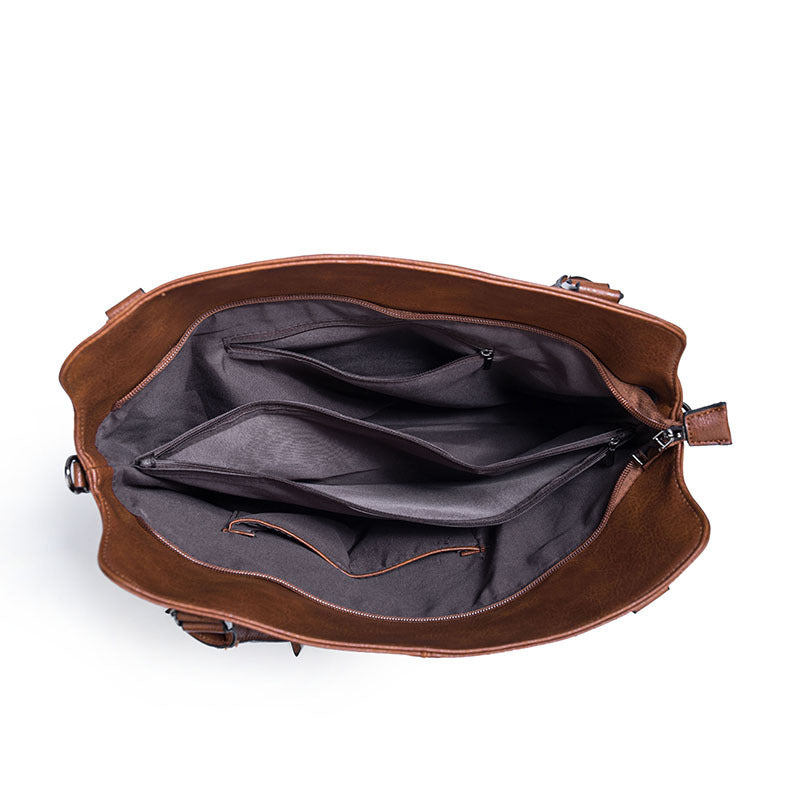 Interior view of MONO//FIT large capacity handbag for women with multiple compartments and dark lining