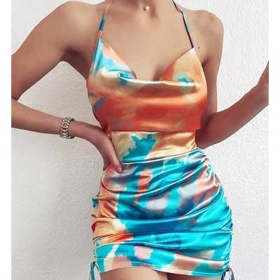 MONO//FIT sleek backless cocktail dress featuring a colorful tie-dye design and adjustable straps