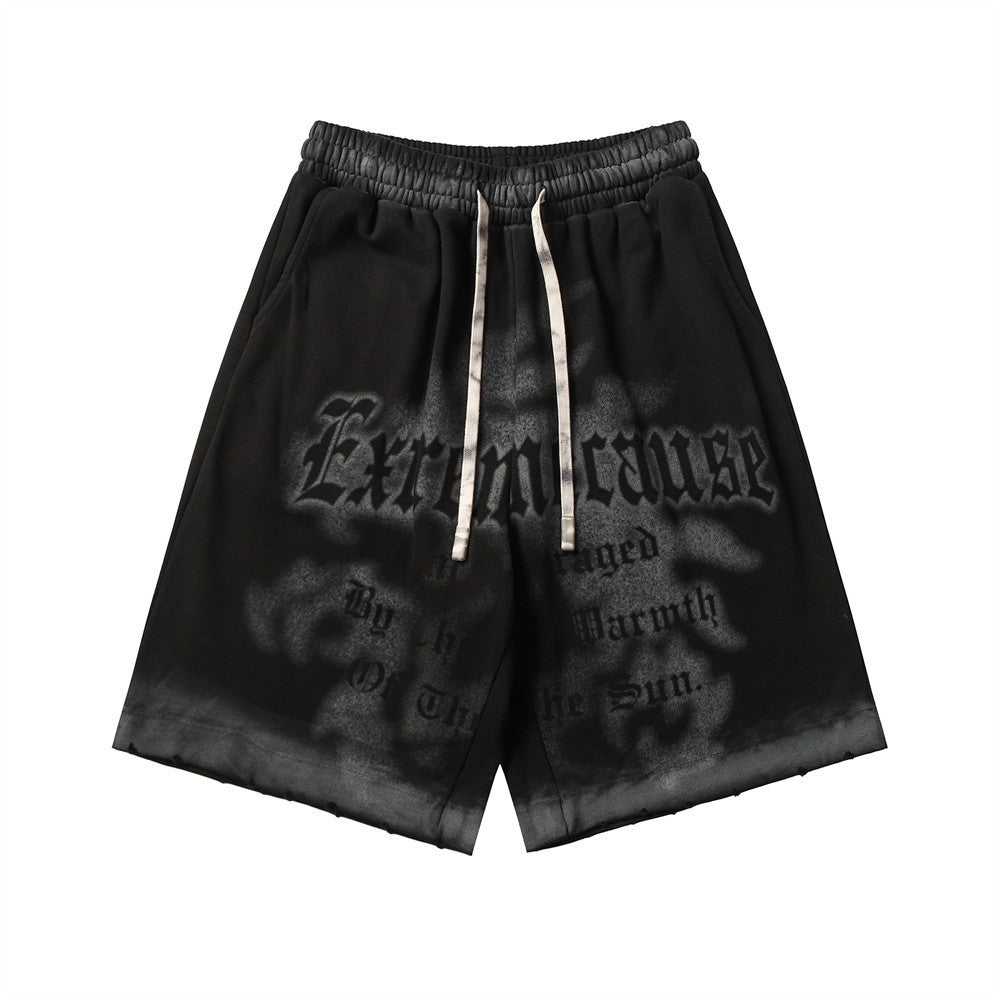 MONO//FIT spray paint style shorts in black with unique graphic design and adjustable drawstring waistband