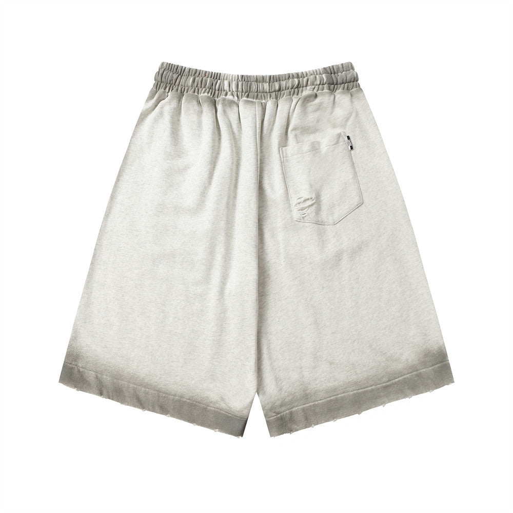 MONO//FIT spray paint style shorts in light gray with an elastic waistband and casual fit