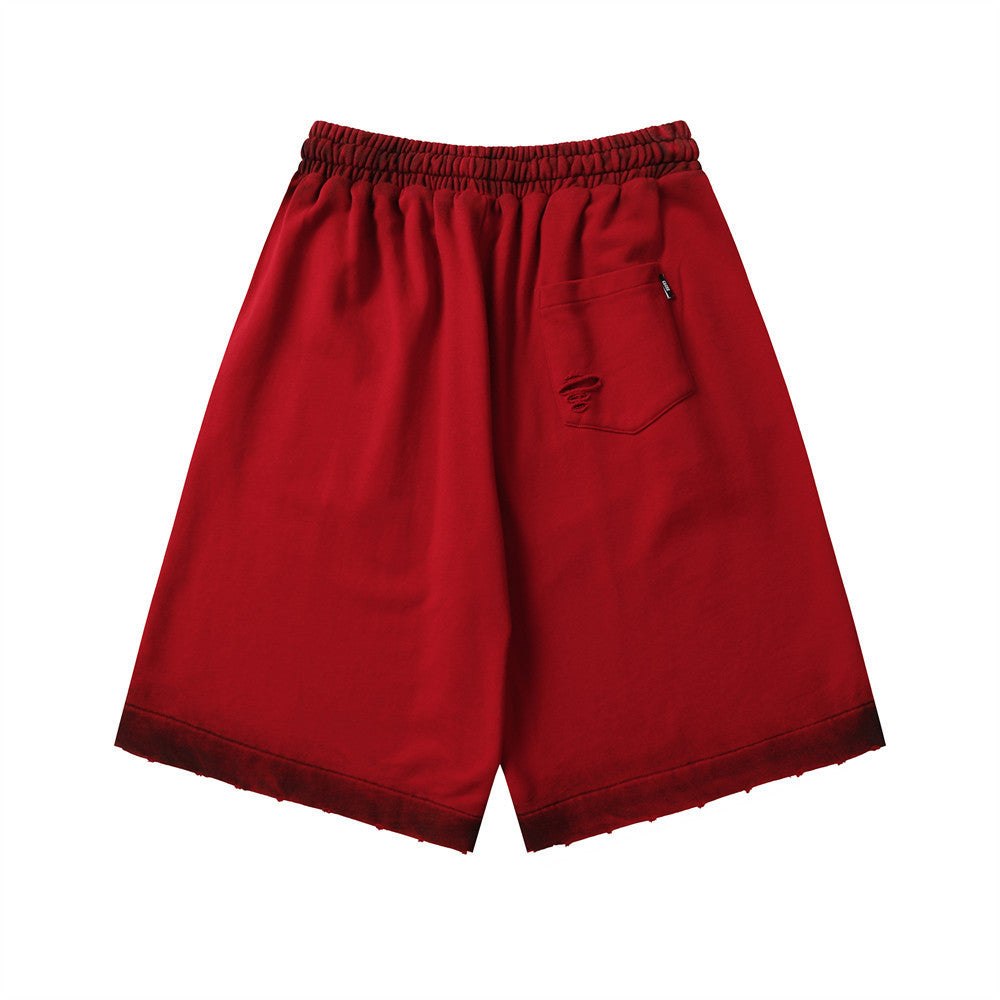 MONO//FIT spray paint style shorts in red with a relaxed fit and a back pocket