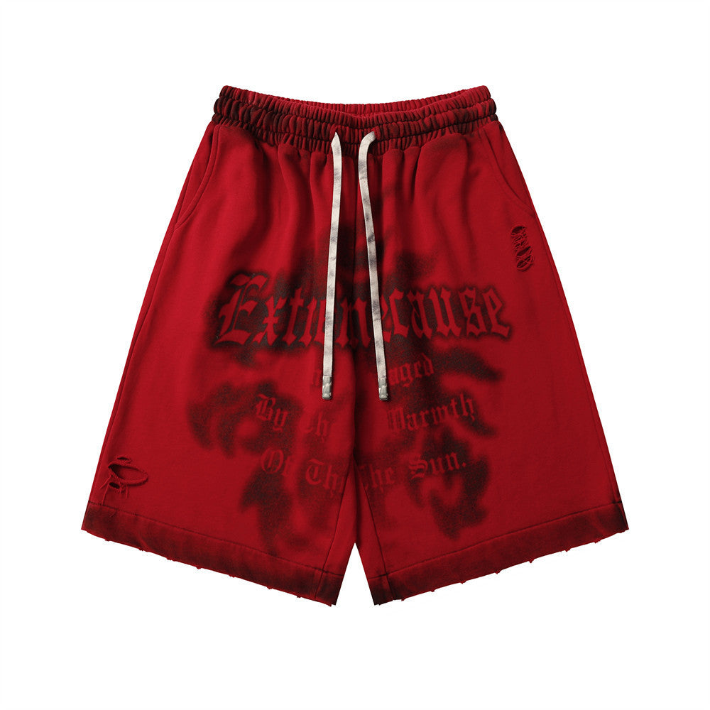 MONO//FIT spray paint style shorts in red featuring a unique graphic design for casual wear