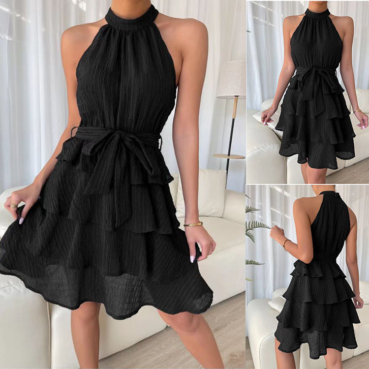 MONO//FIT women's halterneck ruffle dress in black with a chic layered design and adjustable tie waist