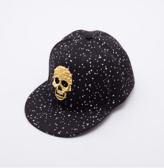 Black MONO//FIT adjustable skull cap for men with a gold skull design on the front