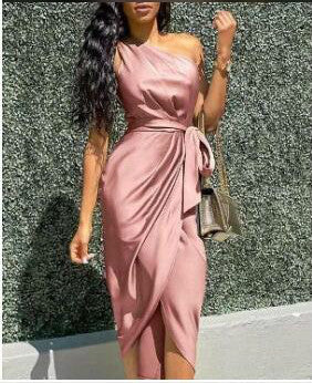 MONO//FIT asymmetric shoulder dress in blush with a stylish wrap design and tie detail
