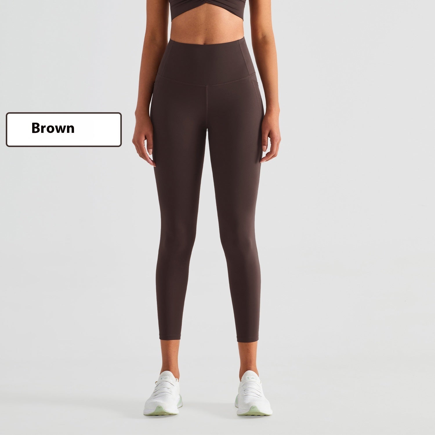 Stylish brown women's fitness leggings designed for comfort and performance during workouts