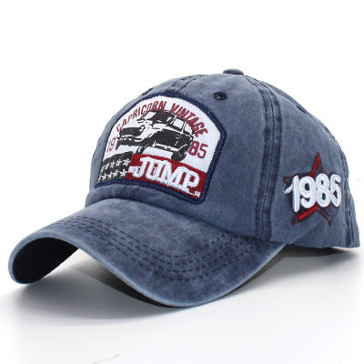 MONO//FIT custom letter baseball cap in navy blue featuring vintage graphics and embroidered details