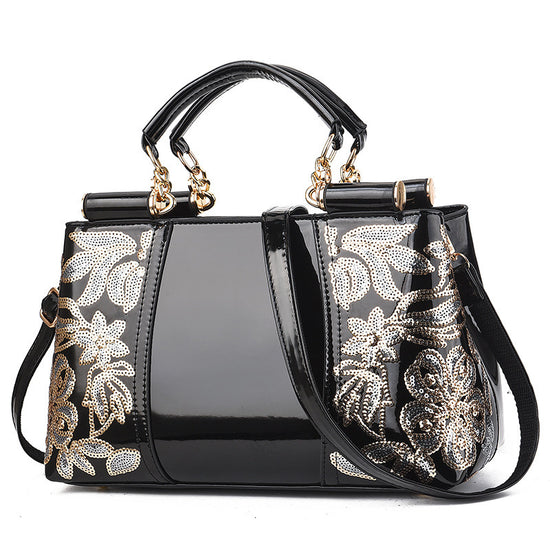 MONO//FIT elegant bridal party bag in black with floral design and dual handles