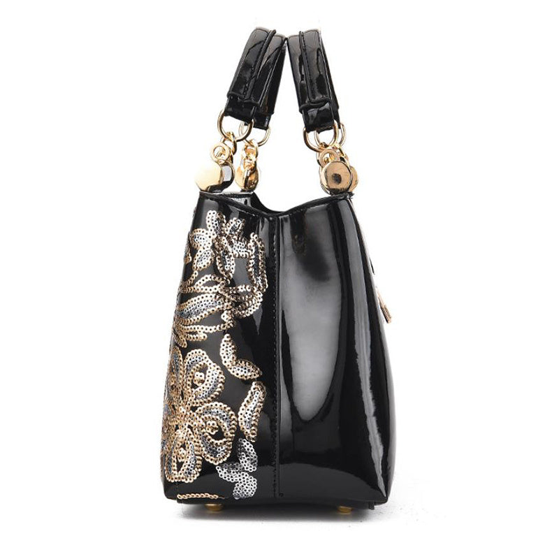 Elegant bridal party bag in black with gold floral design and stylish handles from MONO//FIT