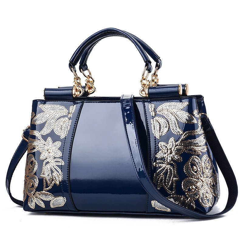 Navy MONO//FIT elegant bridal party bag with floral design and dual handles