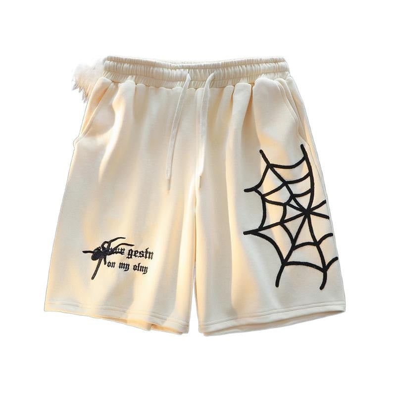 MONO//FIT embroidered spider shorts in cream with spider web design and comfortable fit
