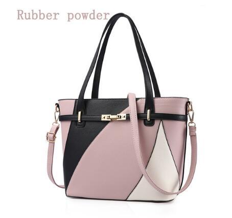 MONO//FIT fashion brand women's handbag in pink, black, and white with stylish geometric design
