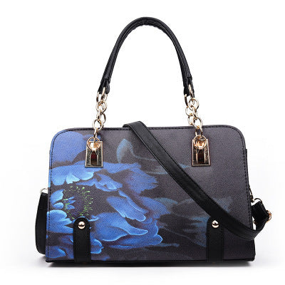 MONO//FIT fashion printed handbag featuring a floral design and dual carrying options