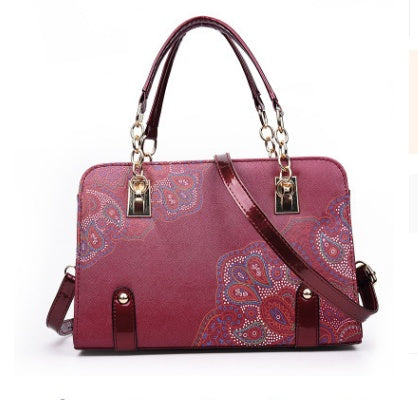 MONO//FIT fashion printed handbag in burgundy with stylish paisley design and dual handles