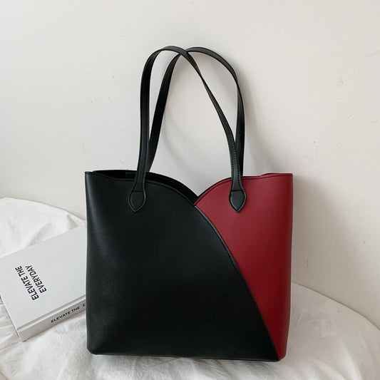 Stylish MONO//FIT fashion shoulder bag for women in black and red color block design