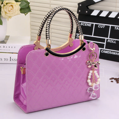 Stylish MONO//FIT purple handbag featuring elegant design and charm, perfect fashion shoulder bags for women