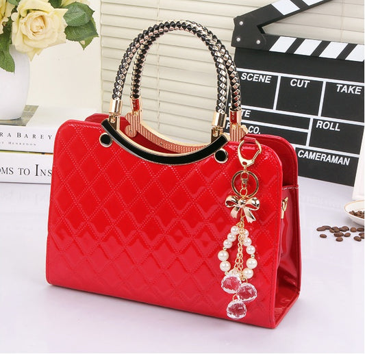 Red MONO//FIT fashion shoulder bags for women with stylish handles and decorative charms