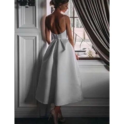 Elegant back view of a MONO//FIT white dress ideal for formal occasions, perfect formal dresses for women