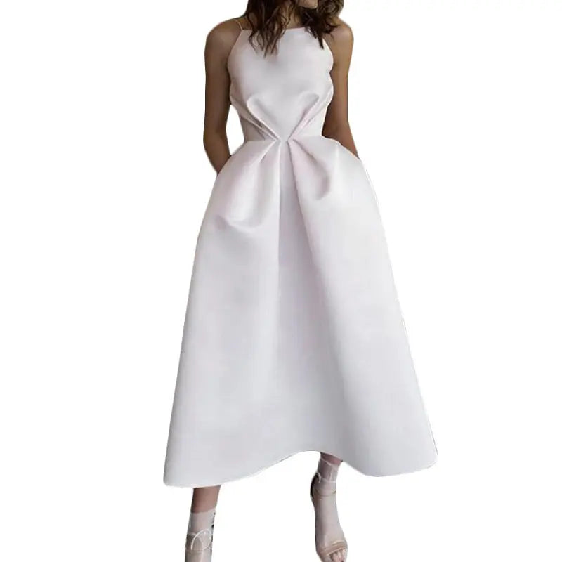 Elegant pink MONO//FIT formal dress for women with a unique bow detail and full skirt