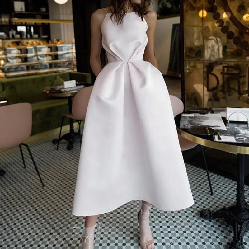 Elegant pink MONO//FIT formal dress for women with a chic A-line silhouette and unique design