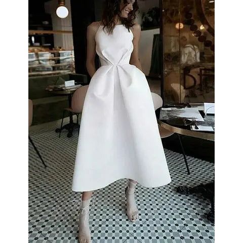 Elegant MONO//FIT white formal dress for women with a flared silhouette and stylish design