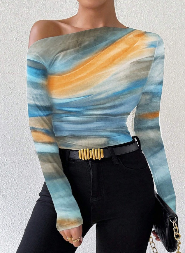 Stylish MONO//FIT graphic long sleeve tops women with a vibrant abstract design in blue and orange hues