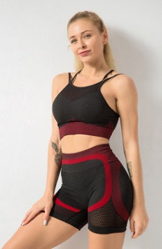 MONO//FIT two-piece gym wear set in black and burgundy with a stylish design for fitness enthusiasts
