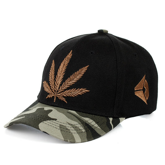 MONO//FIT Men's Cap featuring a green maple leaf design on a black base with a camo brim