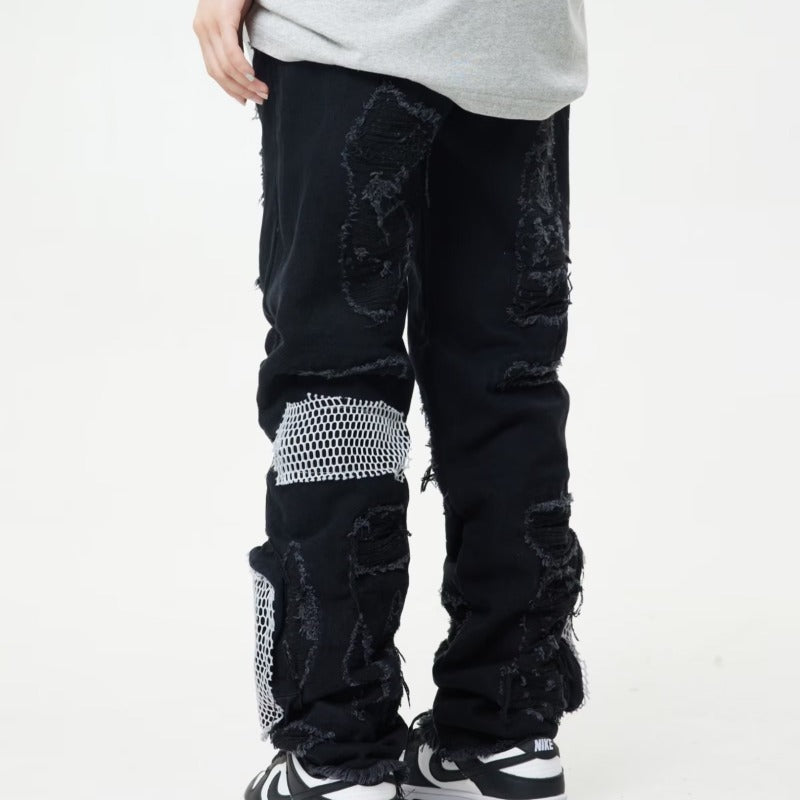 MONO//FIT heavy industry style jeans in black with distressed detailing and mesh panels