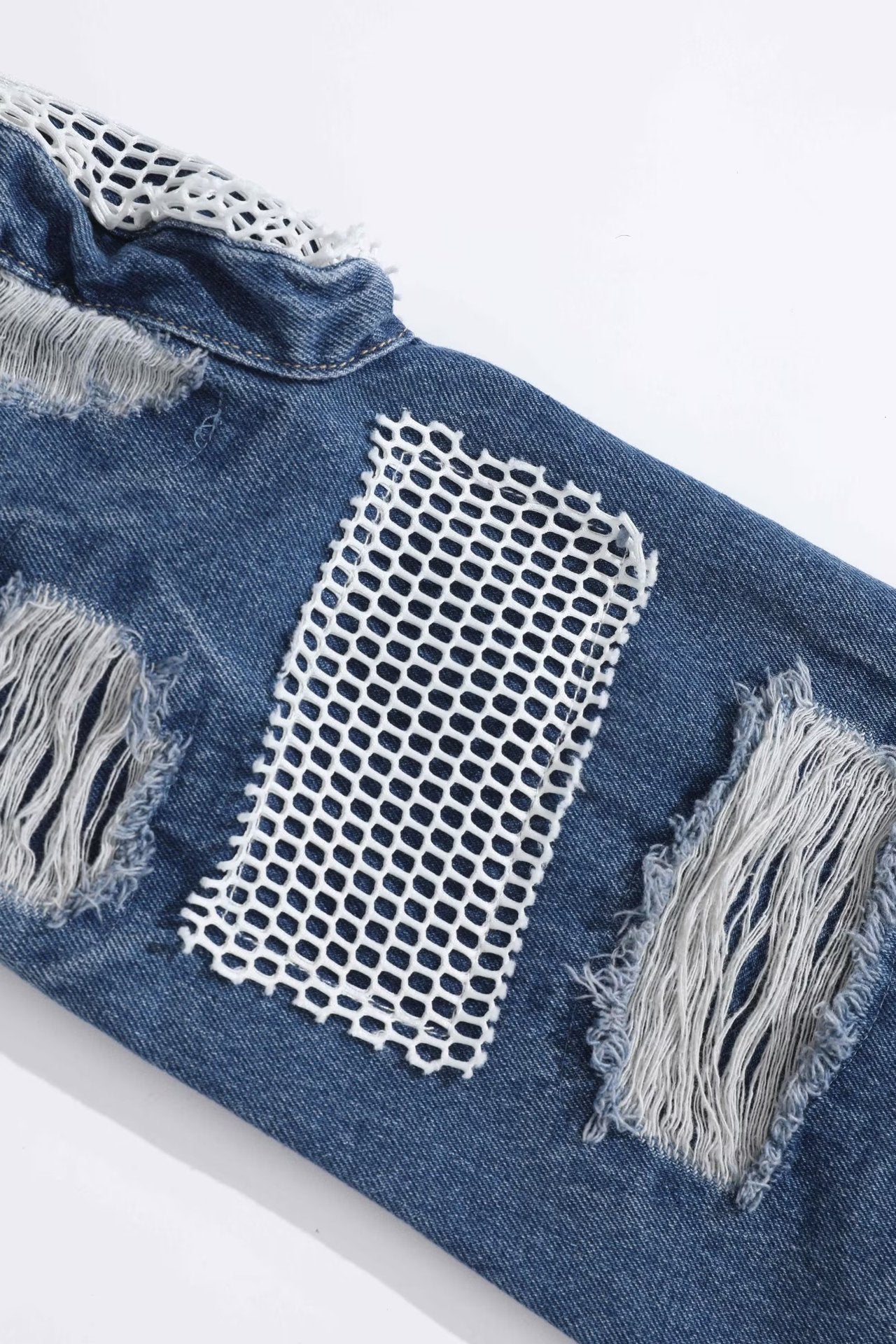MONO//FIT heavy industry style jeans with distressed details and mesh insert for a trendy look