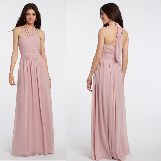 Stunning high fashion bridesmaid dresses in soft pink with a halter neck and flowing skirt