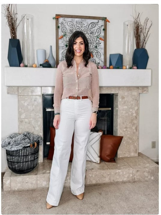 MONO//FIT high waist wide leg jeans in white, paired with a light blouse and heels for a chic look