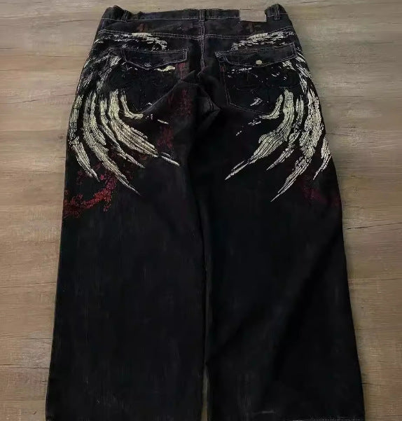 MONO//FIT Hip Hop embroidered jeans with unique wing design on the back pockets