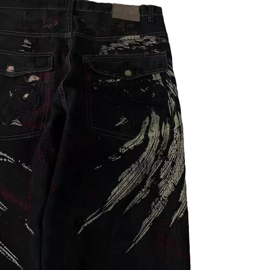 MONO//FIT Hip Hop embroidered jeans featuring unique artistic designs and a stylish black finish