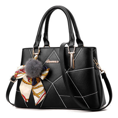 Stylish MONO//FIT Korean fashion handbags in black with decorative scarf and pom pom