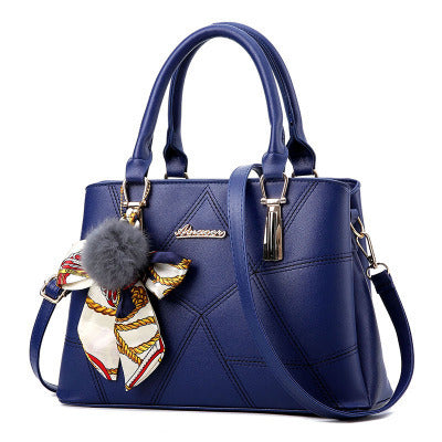 Stylish MONO//FIT Korean fashion handbags in navy with decorative scarf and pom-pom detail