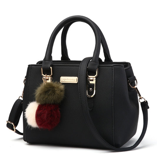 MONO//FIT Korean one-shoulder bag in black with a stylish pom-pom charm and adjustable strap