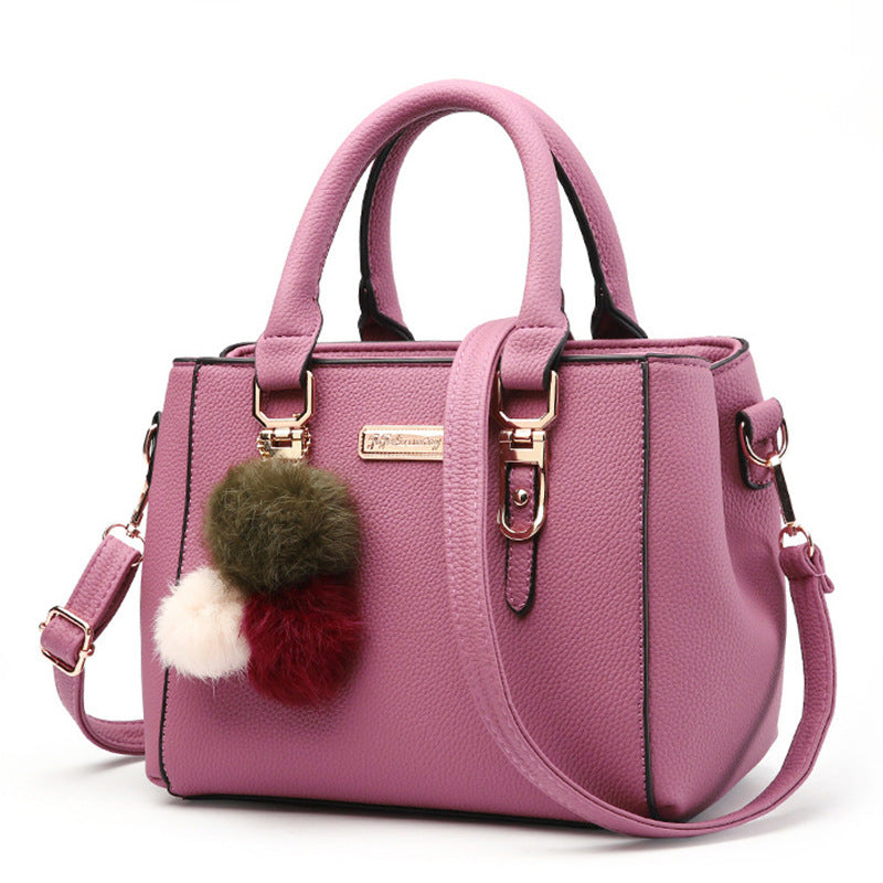 MONO//FIT Korean one-shoulder bag in pink with stylish pom-pom charm and dual handles