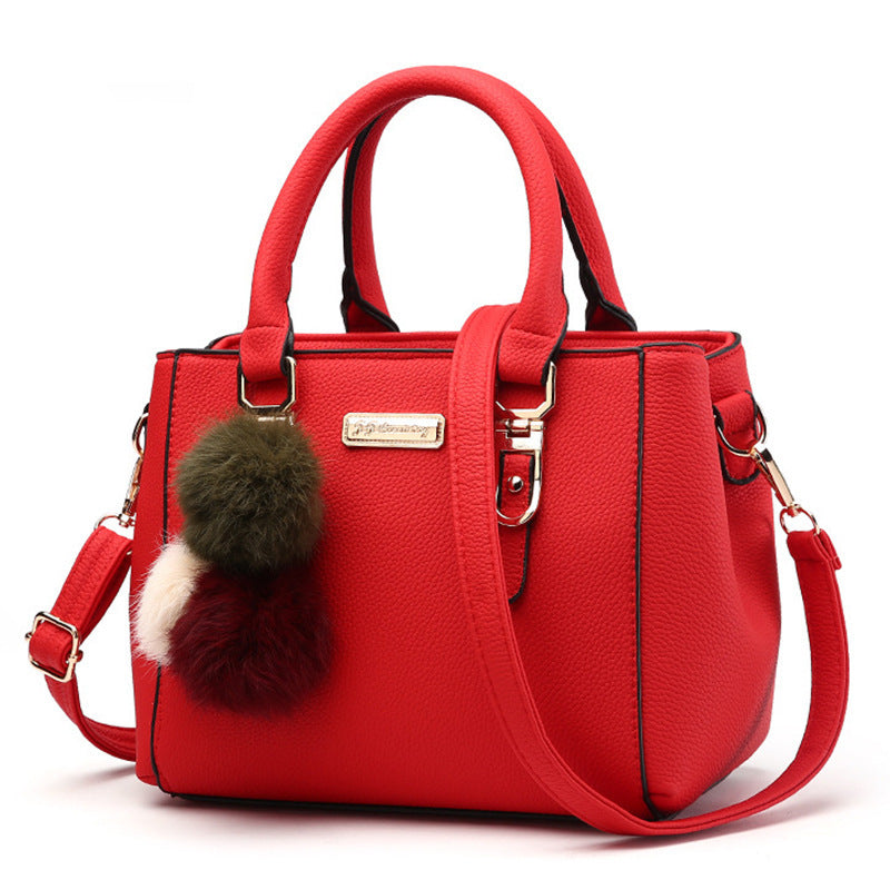 MONO//FIT Korean one-shoulder bag in red with stylish pom pom keychain and dual handles