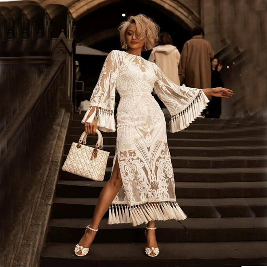 Elegant MONO//FIT lace embroidered tassel dress with bell sleeves and high slits for a stylish look