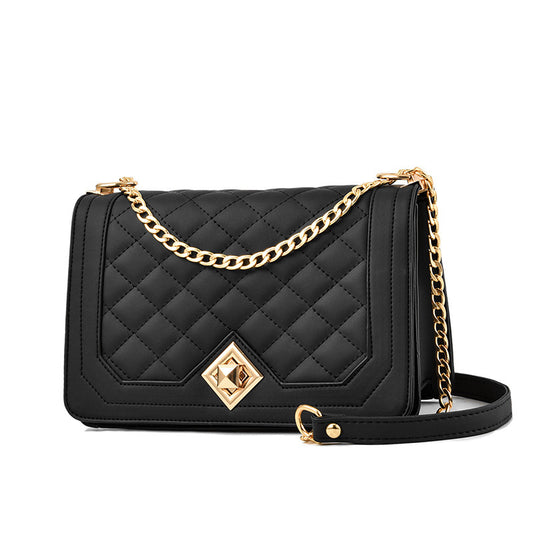 Luxury embroidered shoulder bag in quilted black leather with gold chain strap and elegant design
