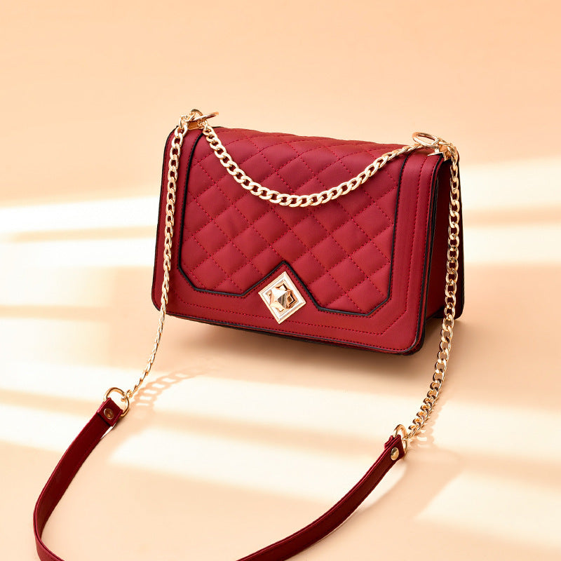 MONO//FIT luxury embroidered shoulder bag in red with quilted design and chain strap