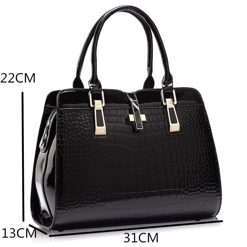 Stylish MONO//FIT luxury women's handbags in black with textured finish and elegant design